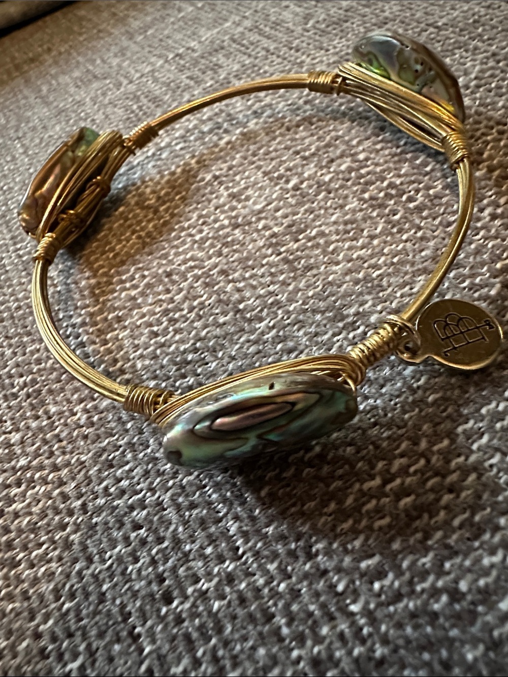 Bourbon and Boweties Gold-Tone Bangle with Iridescent Abalone Accents